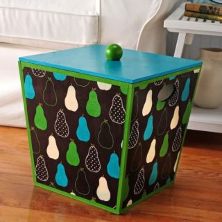 I wanted a unique storage solution for my yarn, so I made this fabric covered box with a fun pear print and Mod Podge! It's easy to do.