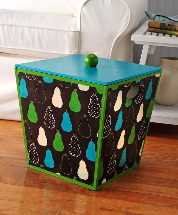 I wanted a unique storage solution for my yarn, so I made this fabric covered box with a fun pear print and Mod Podge! It's easy to do.