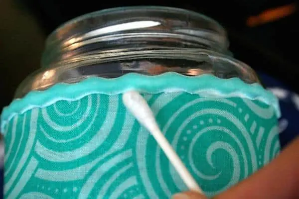 Cleaning up craft glue with a cotton swab