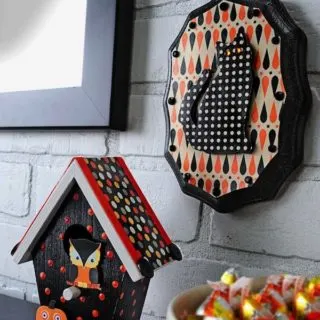 Make these mini Halloween decorations using $1 plaque and $1 birdhouses from the craft store. Very easy, colorful, and fun!