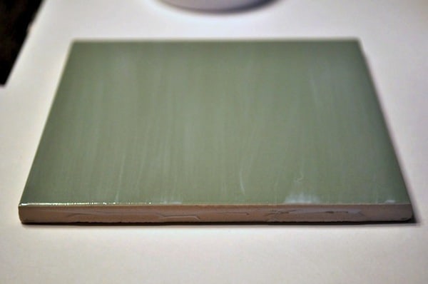 A thin coat of Mod Podge painted on a tile