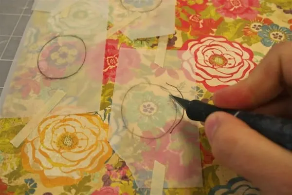 Cut out scrapbook paper with a craft knife