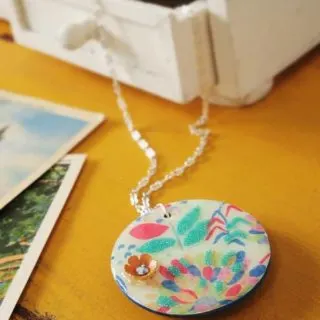 For this unique necklace DIY you'll use a wood pendant, Dimensional Magic, and the image of your choice. Great for gifts and easy to personalize!