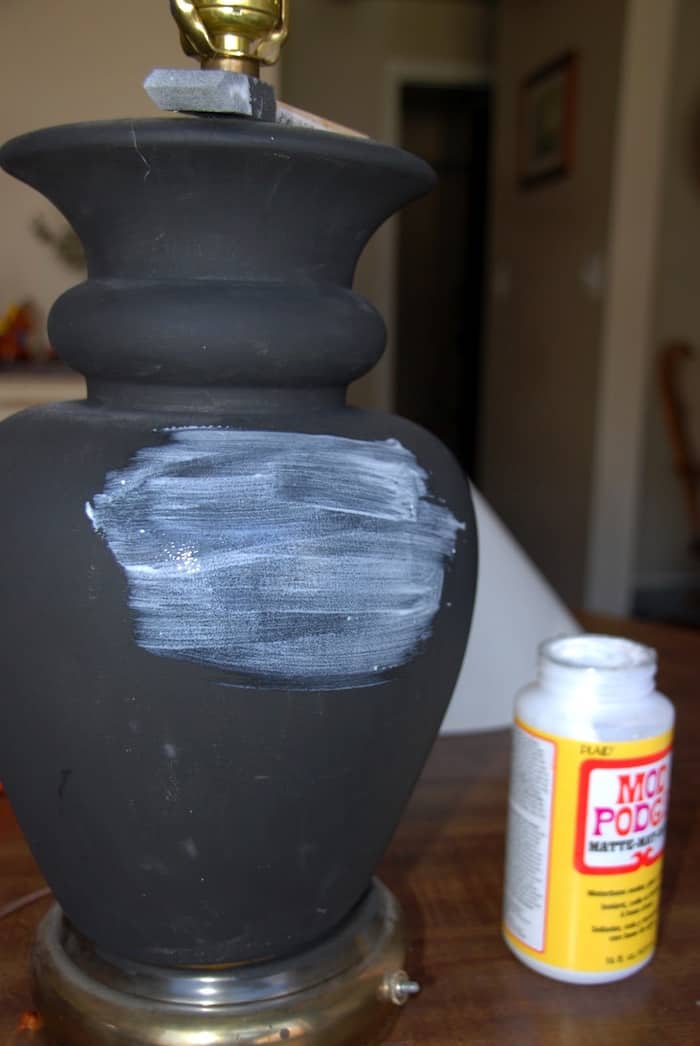 Paint a layer of Mod Podge on the lamp base