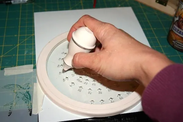 Use a circle cutter on Shrinky Dink material