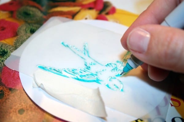 Coloring in a stencil using a Sharpie on a Shrinky Dink