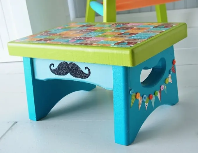 If you're looking for circus themed crafts, this decoupage stool fits the bill. I added pennants and then glitter to really make it special.