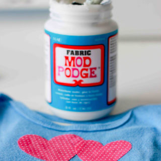 Personalized onesies with Fabric Mod Podge