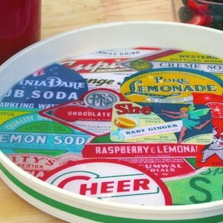 This DIY lazy susan is so cool - it was created from a planter saucer! Head to the hardware store and collect some vintage images for this fun craft.