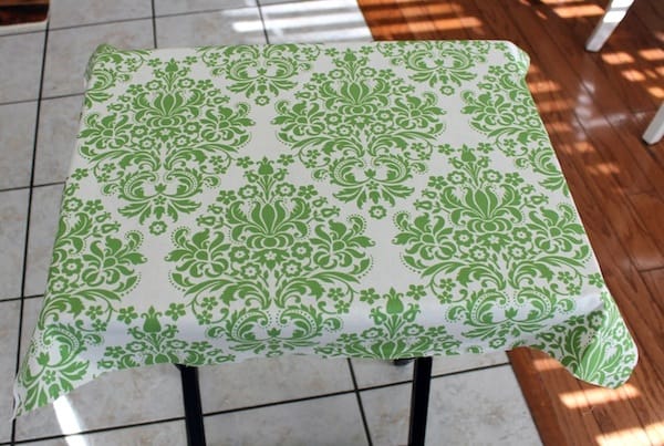 Smoothed fabric over the tray table top