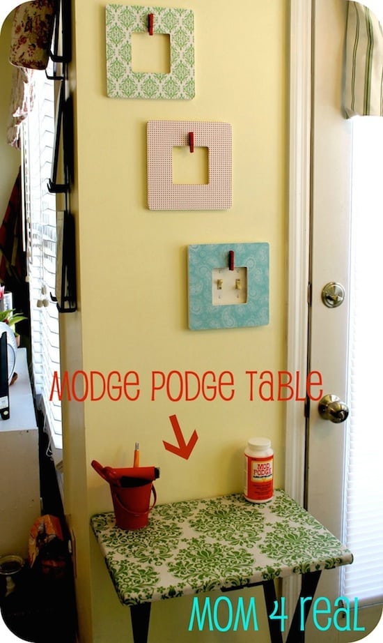 Don't throw out that used TV tray - turn it into a DIY craft table using fabric and Mod Podge! Just cover the top with your favorite pattern: so easy!