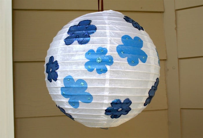 This is yet another great way to DIY your next celebration - decorate a party lantern lantern with glitter and Mod Podge. So easy!