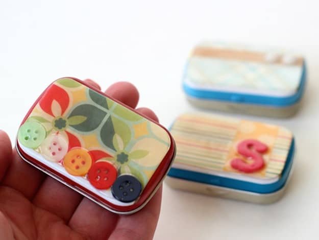 Revamped altoid tins with scrapbook paper and Mod Podge