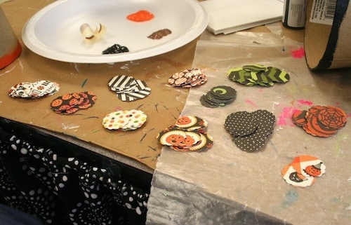 Piles of scalloped circles from Halloween scrapbook paper