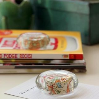 Create gorgeous, customizable DIY paperweights from dollar store glass candle holders! This easy project makes a great gift idea, and you can personalize!