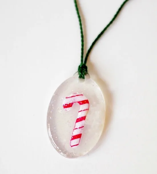 Heidi from Hands Occupied uses the most fun Christmas design and Dimensional Magic to create a unique (and easy!) candy cane necklace.