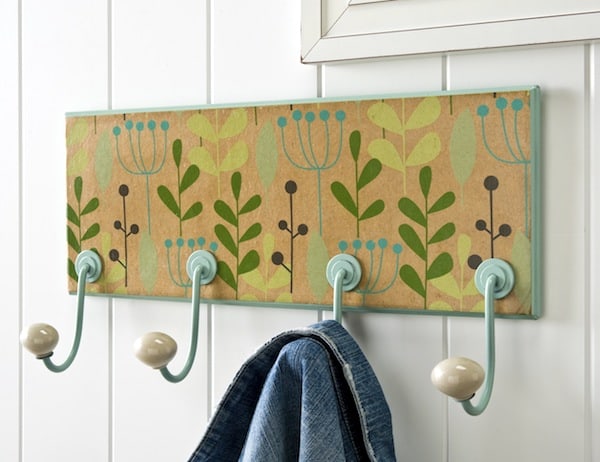 Cute coat rack made with Mod Podge and wrapping paper