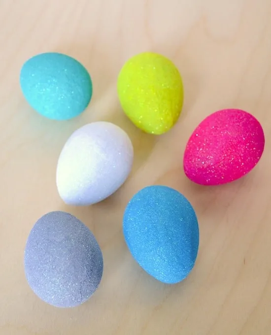 Glitter eggs in white, pink, blue, purple, yellow, and aqua