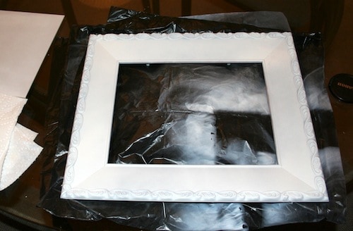 Frame sprayed with white primer