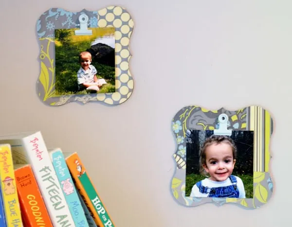 DIY clip frames hanging on the wall with photos in them
