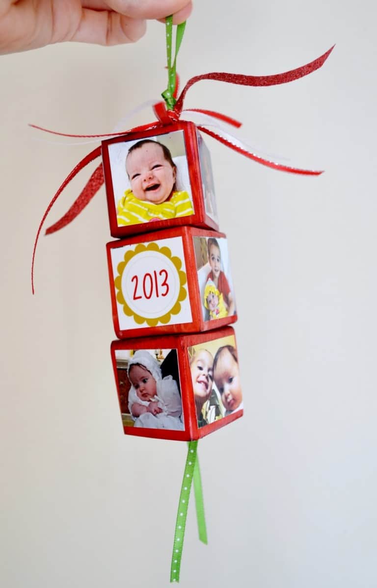 Create festive, personalized photo Christmas ornaments using your favorite pictures, wood blocks and Mod Podge. These make great gifts!