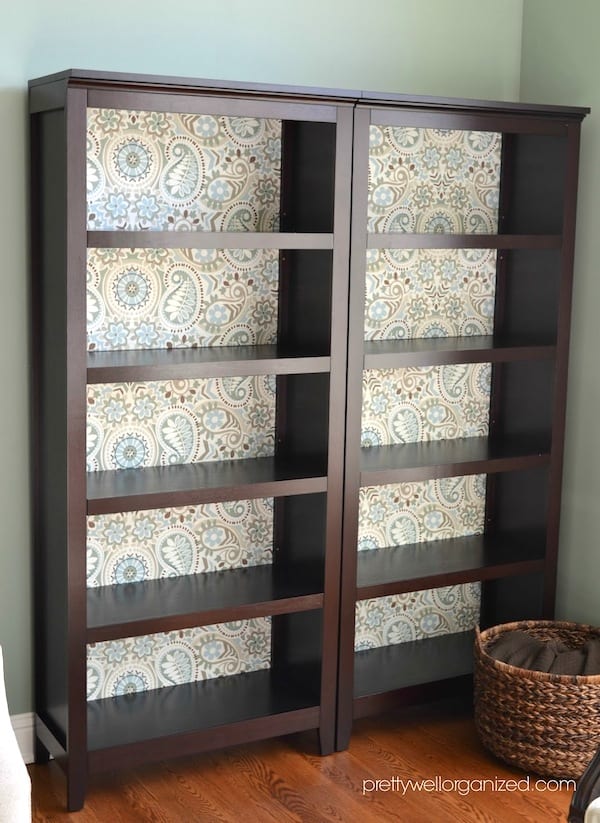 How to decoupage a bookcase with fabric