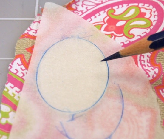 Trace a metal blank with tracing paper and a pencil