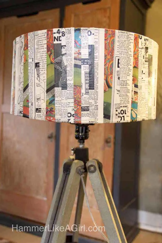 Finished decoupage lampshade on a tall lamp stand