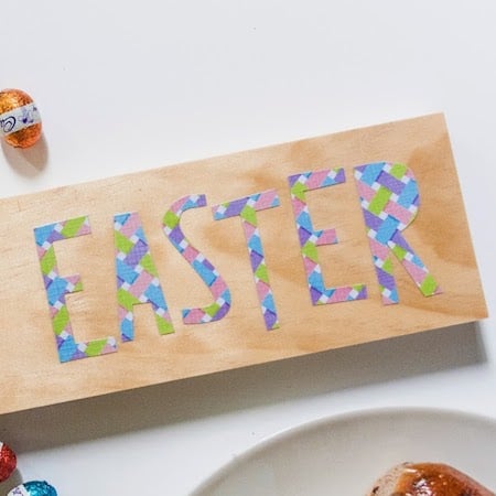 Learn how to decoupage a simple Happy Easter sign with a fun font. Just use Mod Podge and your favorite paper patterns to make it your own!