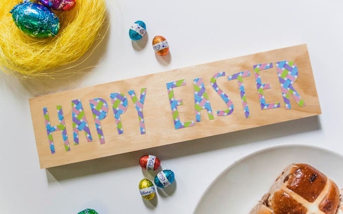 Learn how to decoupage a simple Happy Easter sign with a fun font. Just use Mod Podge and your favorite paper patterns to make it your own!