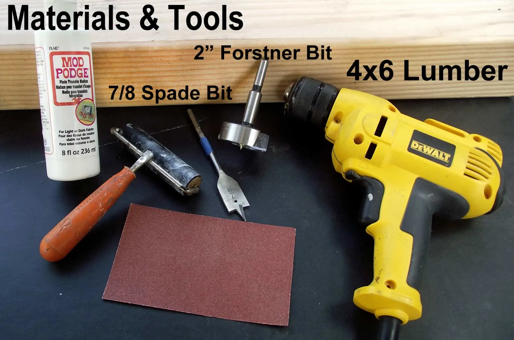 Mod Podge photo transfer medium, brayer, sandpaper, lumber, drill bits, and DeWalt drill