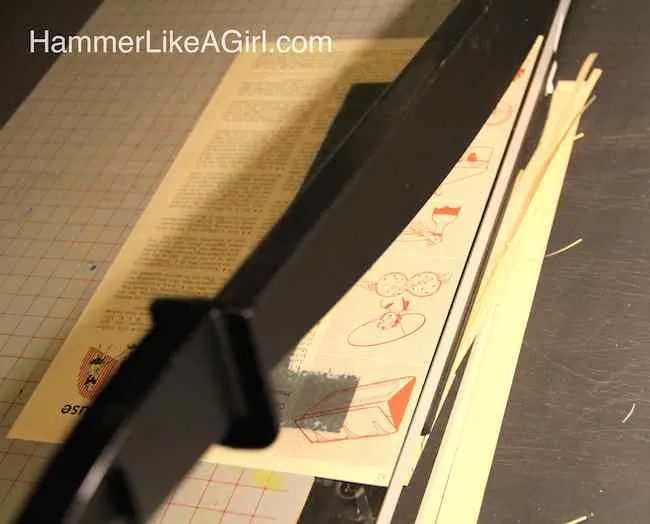 Trimming the pages with a paper cutter