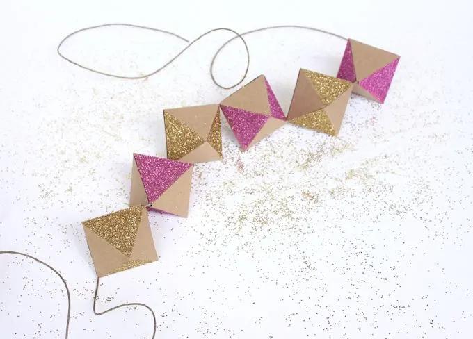 DIY paper garland sprinkled with glitter