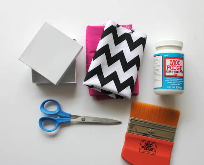 gift box, fabric, Mod Podge Fabric, scissors, and a paintbrush