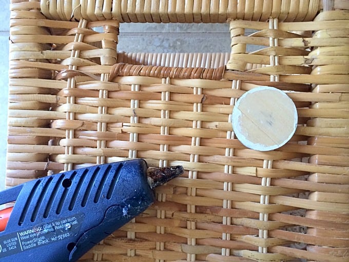 Hot glue gun, basket, and the back of a basket label