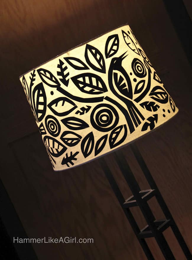 This Mod Podge lamp shade is an easy-to-do decoupage project involving cut black paper and your favorite shapes. Get the tutorial here!