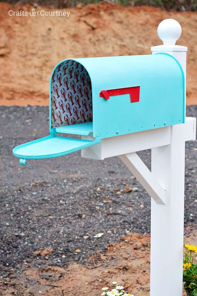 decorative mailbox with a coastal theme
