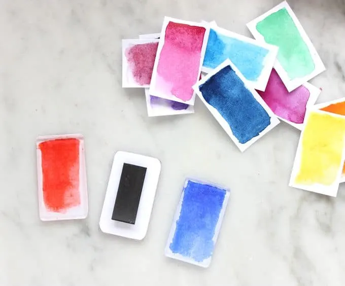 Make these cool watercolor DIY magnets using Podgeable shapes and Paper Mod Podge. They look great in a rainbow palette!
