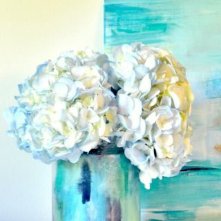 Bring in spring with a beautiful DIY vase you can make with Mod Podge and painted watercolor paper. No skillset required!