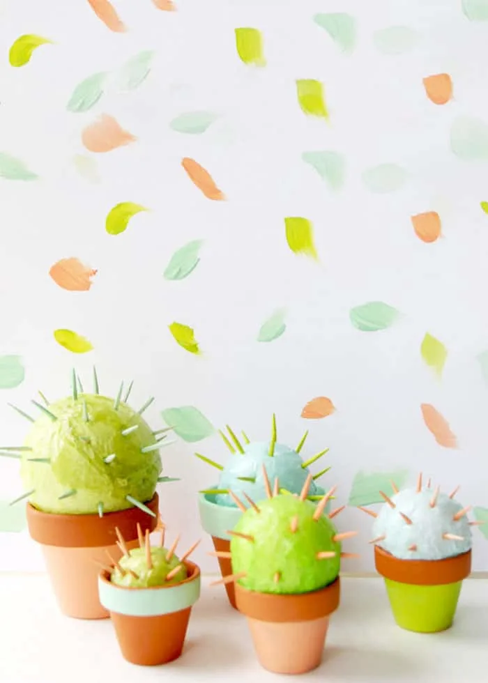 Make cute cacti with tissue paper, Mod Podge, and toothpicks