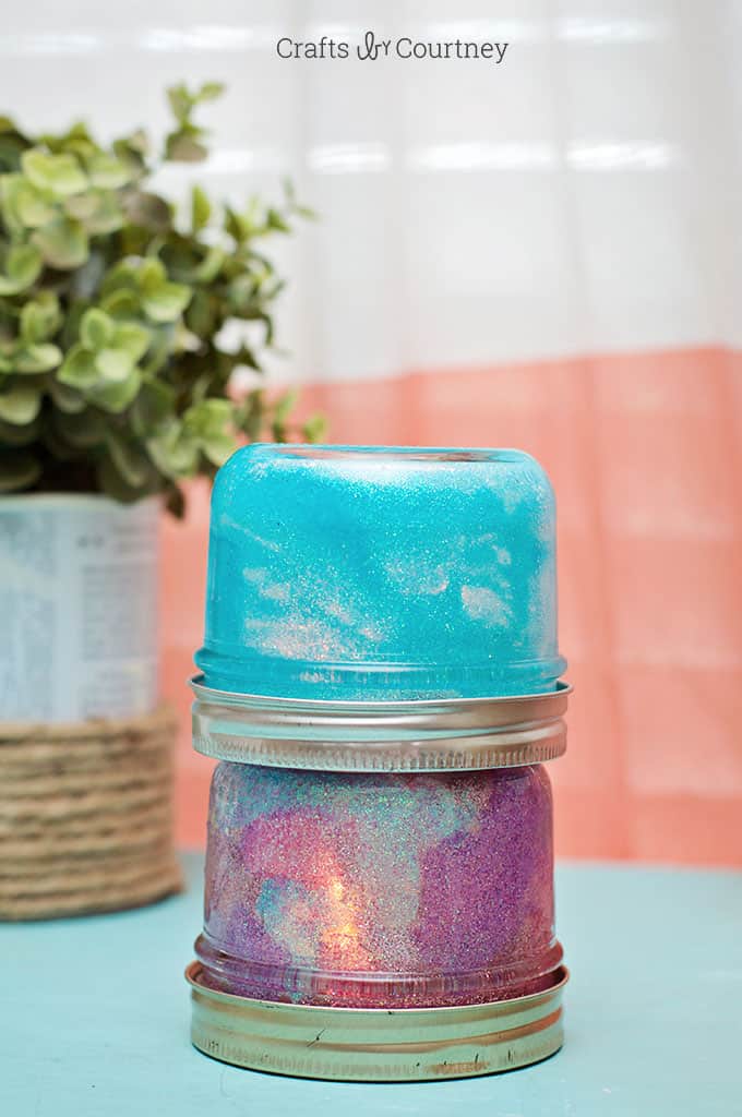 This DIY mason jar night light can be made on a budget - and your kids can help. The glitter is so sparkly and fun!