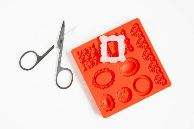 Hot glue gun frame, silicone mold and tiny scissors