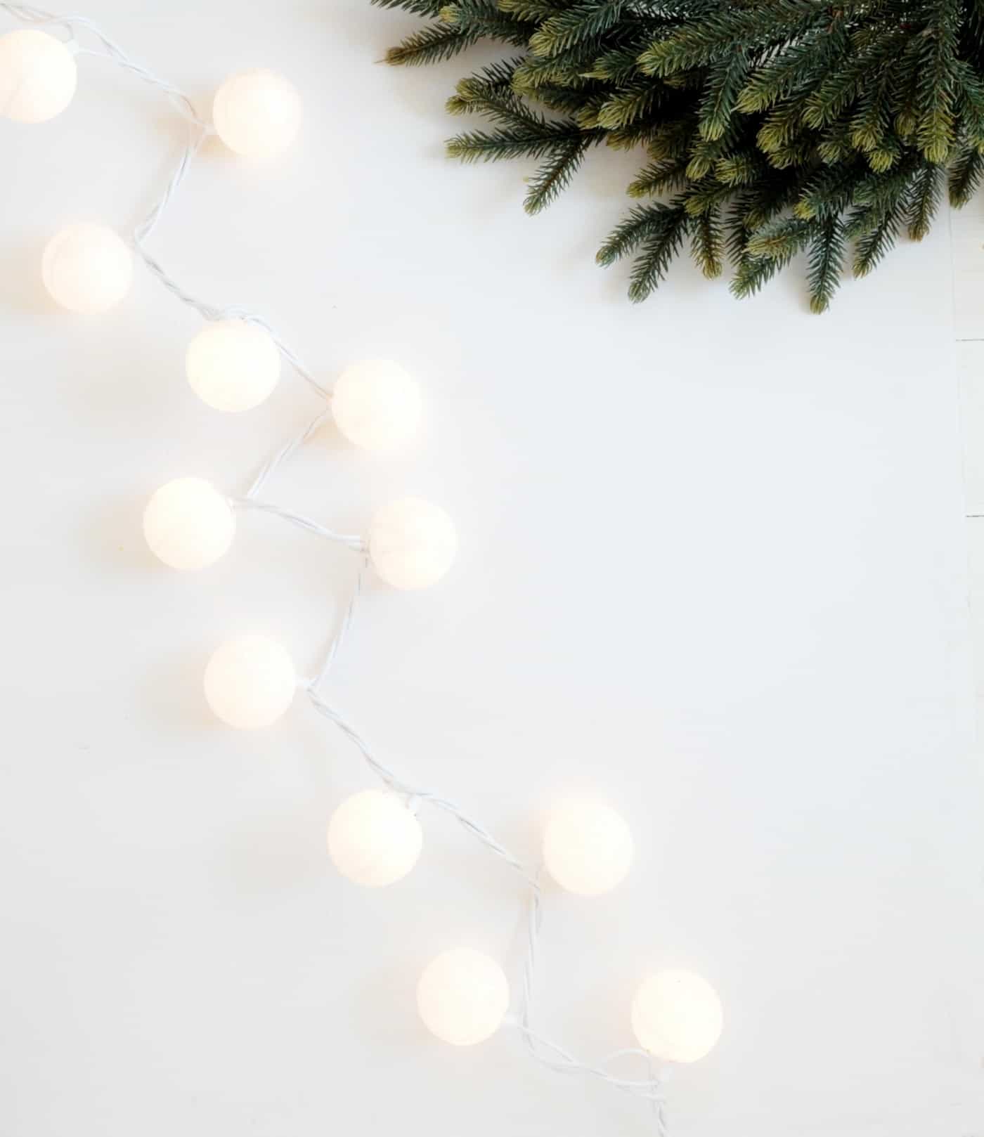 Are you ready to start decorating for Christmas yet? These DIY Christmas lights are easy to make and look like you have glittery snowballs decorating your home!
