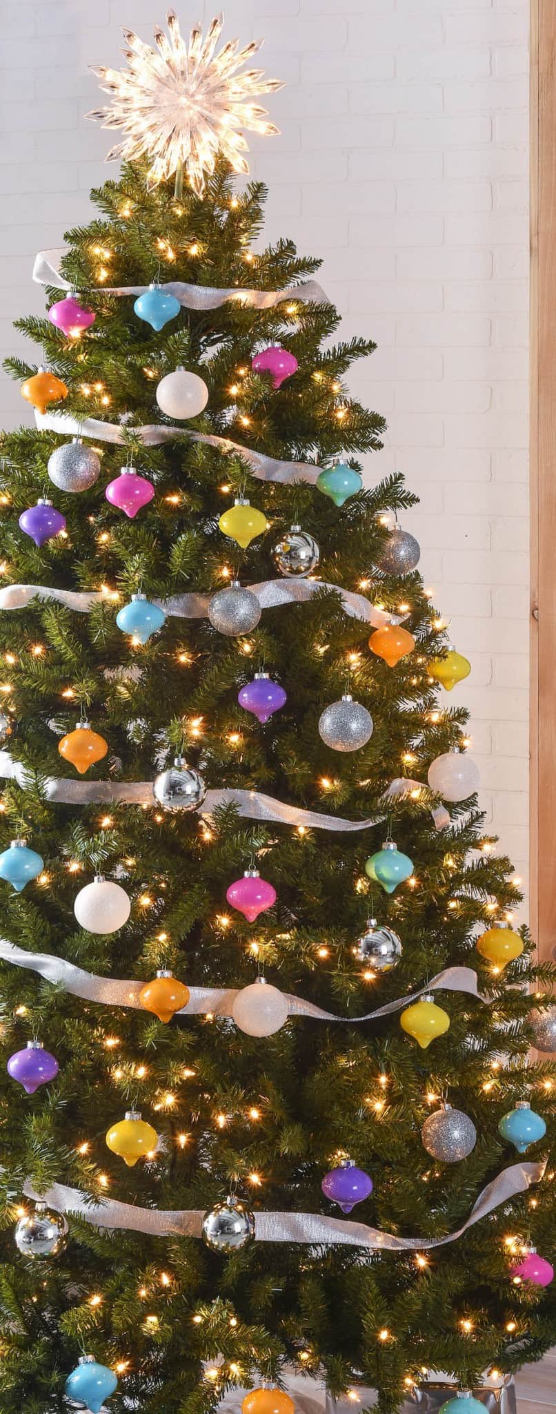 This colorful Christmas tree was inspired by a vintage palette! Learn how to make simple drop ornaments to create a tree just like this one. 