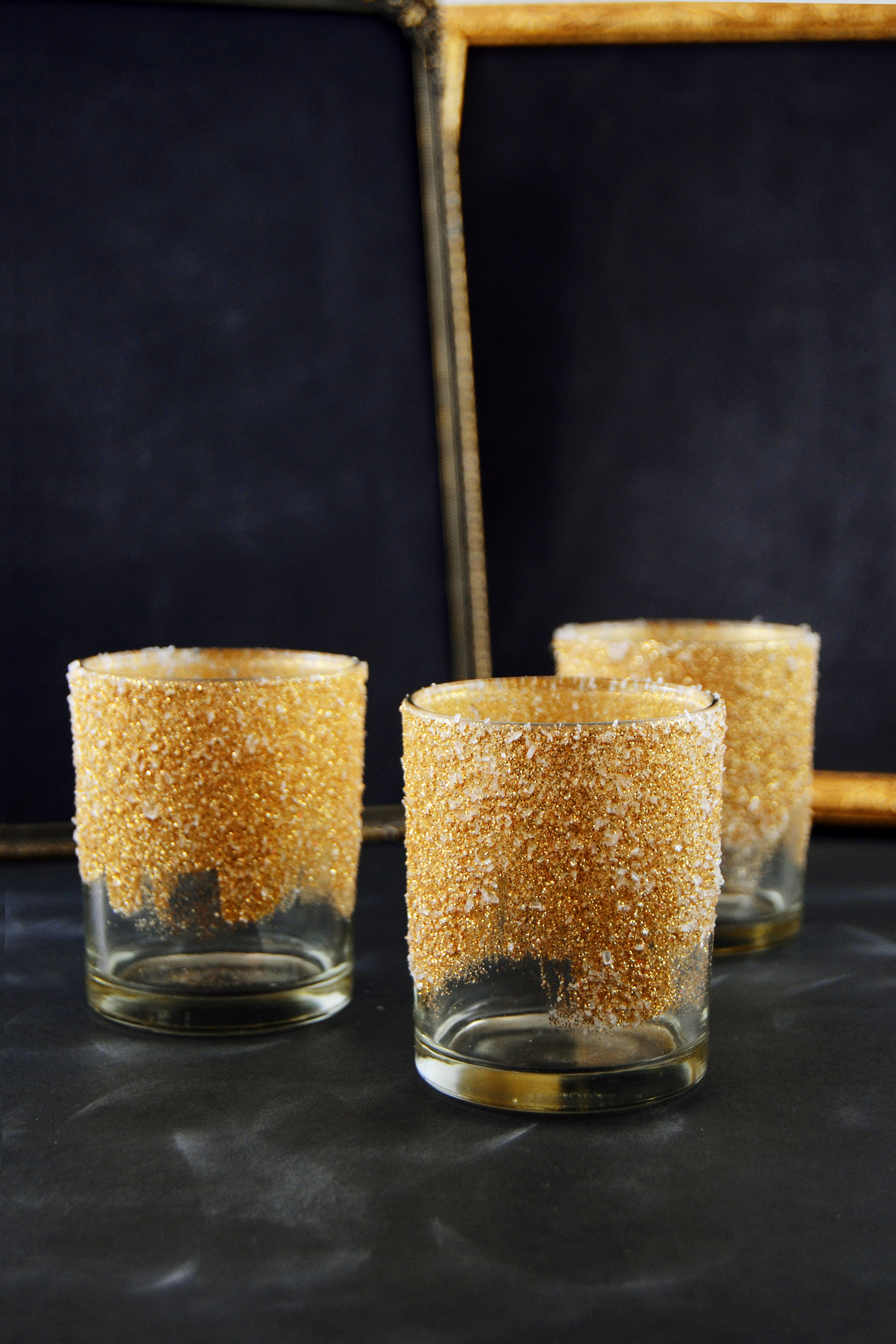 These DIY glitter votives are guaranteed to make your table setting sparkle this Christmas, New Year or whenever you have a gold-themed party!