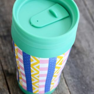 Decorate a travel mug with paper and Dishwasher Safe Mod Podge