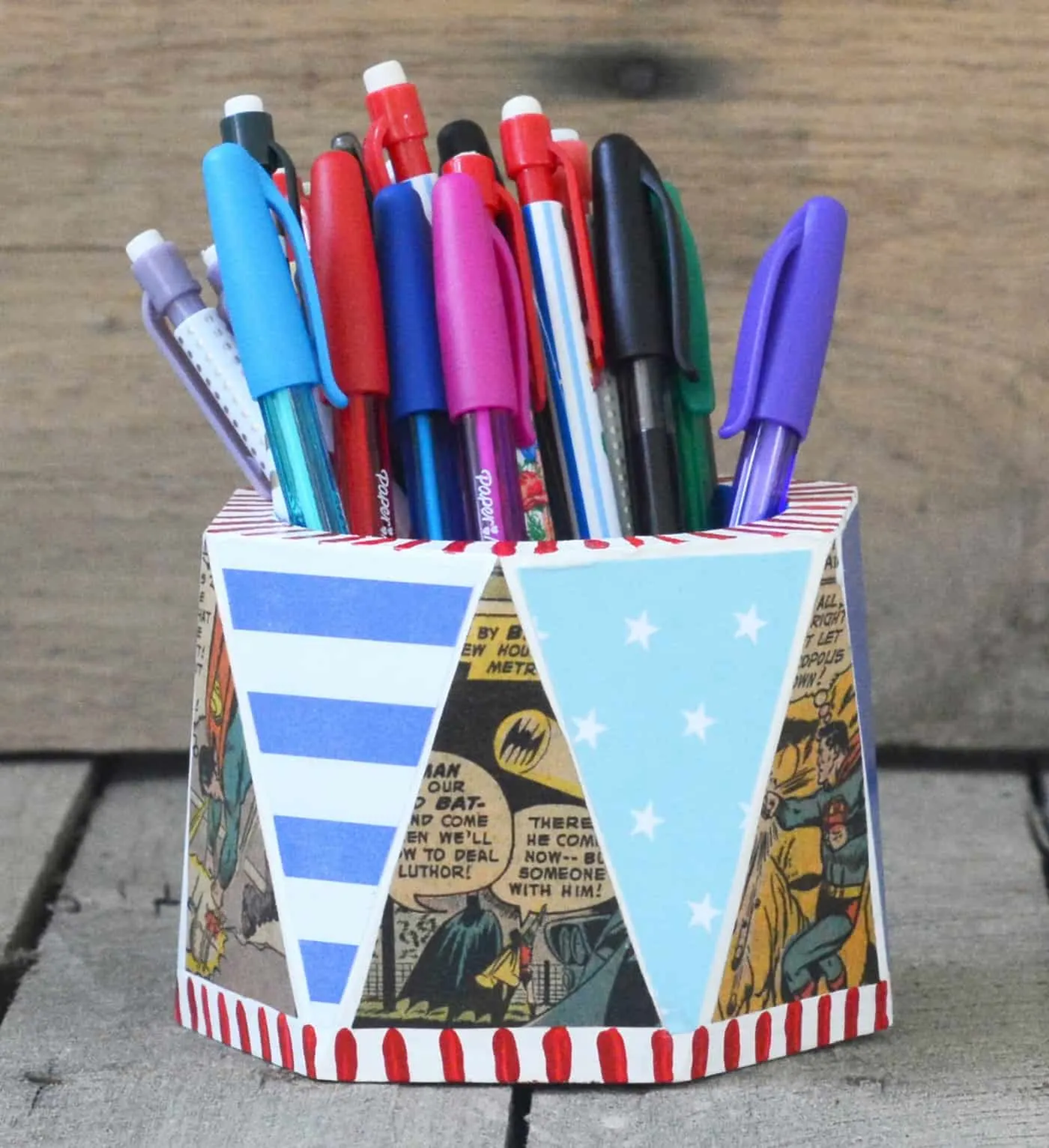 DIY pencil cup covered in comic books