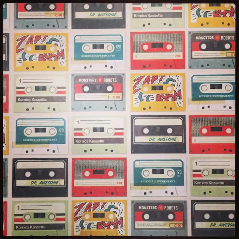 Piece of scrapbook paper with a cassette tape pattern