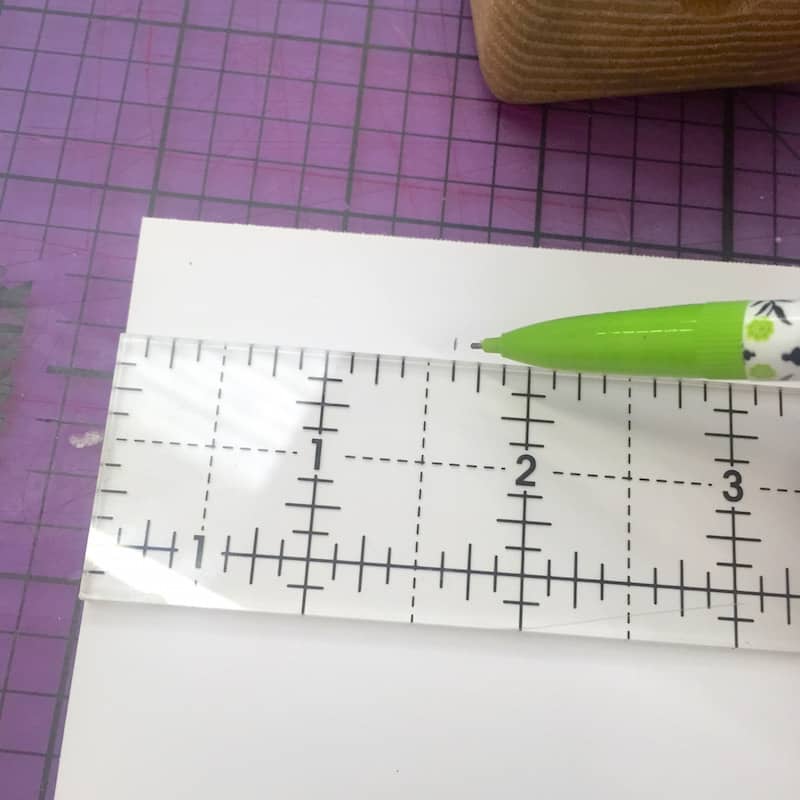 Marking paper with a ruler and a pencil