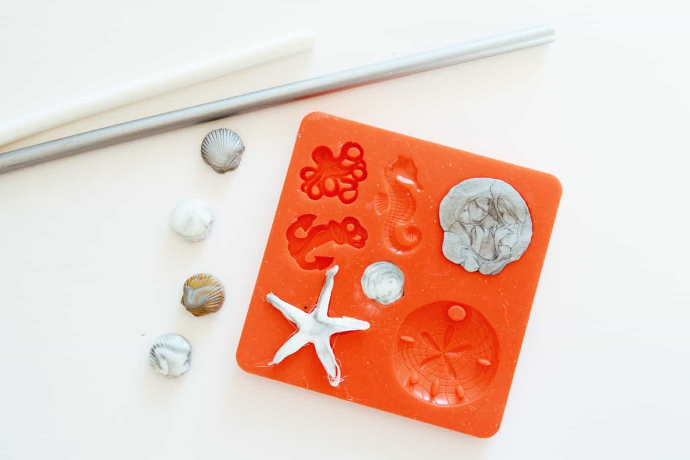 Hot glue sticks swirled into a beach themed silicone mold
